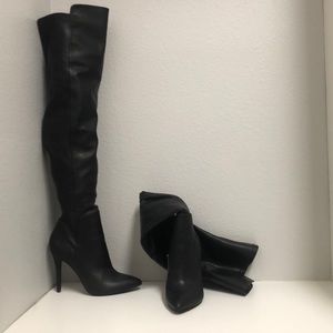 Thigh high black boots